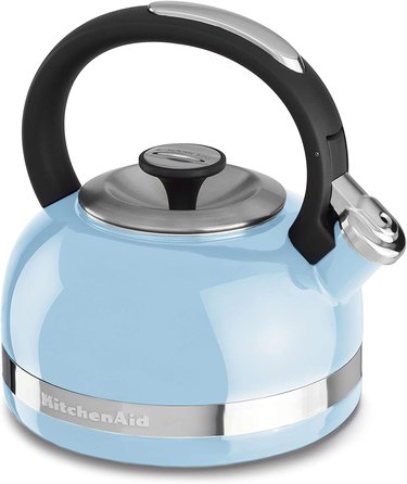 light blue whistling tea kettle