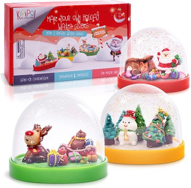 Craft kit that makes 3 snowglobes with Christmas characters like Santa, Rudolph, Frosty and more.
