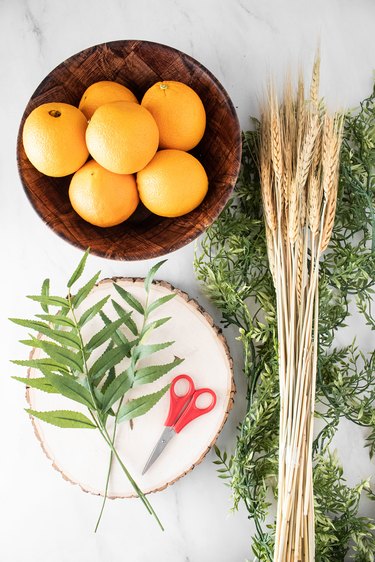 Supplies for an orange greenery centerpiece