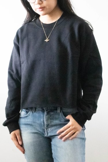 Model wearing the finished cropped sweatshirt look
