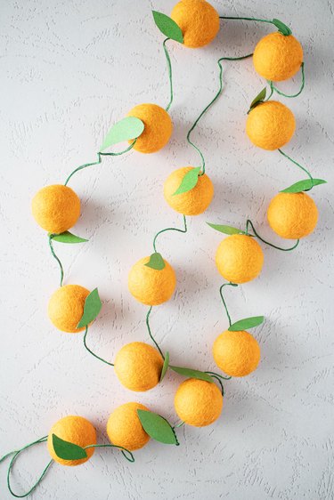 Wool felt orange garland for a holiday table