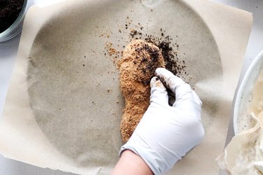 Adding Oreo crumbs to mini ice cream turkey legs