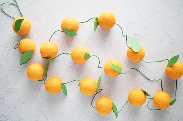 Garland of oranges for the holiday table or tree