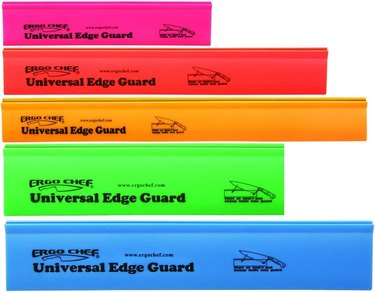 5 multicolored knife blade guards of varying sizes