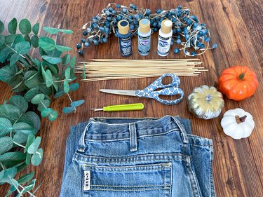 Materials needed for blue pumpkin and feather wreath