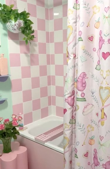 Pink and white checkerboard tiles in a bathroom