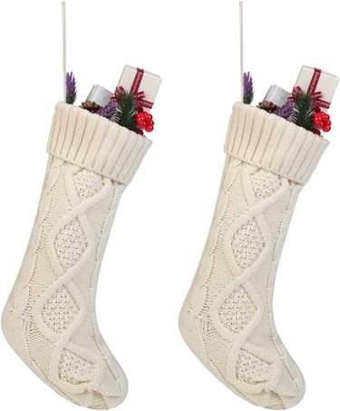 Two beige cable knit stockings
