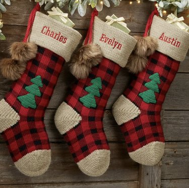Three red and beige Christmas stockings