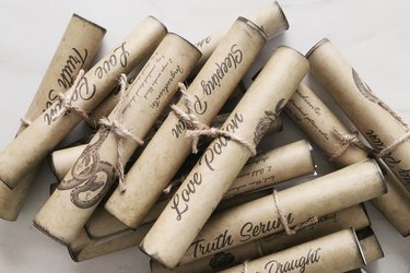 Roll potion notes and tie with twine