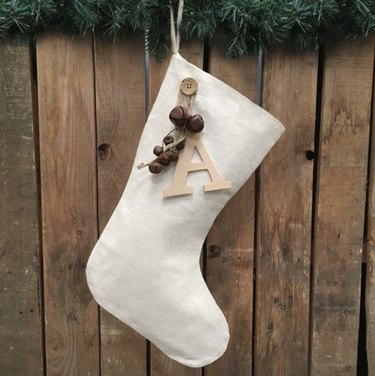 White stocking with letter and bells