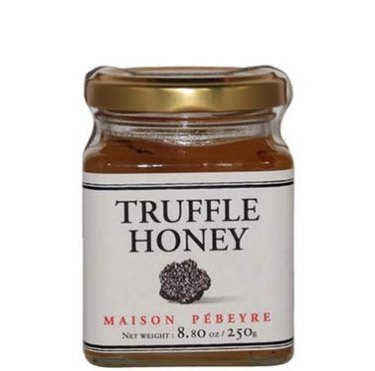 Truffled honey from French producer Maison Pébeyre, shown on a white ground