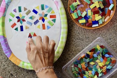 Adding mosaics to a DIY sugar skull stepping stone