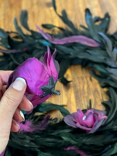 push flowers into the Styrofoam feather wreath