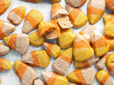 Baked candy corn cookies on parchment paper