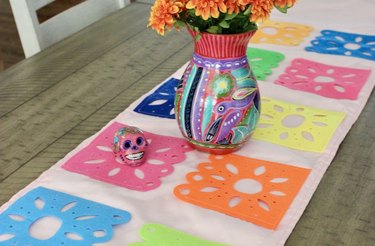 Day of the Dead table runner with vase on top