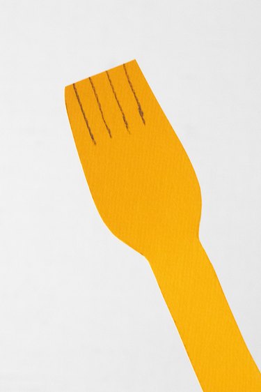 Paper fork with pencil markings