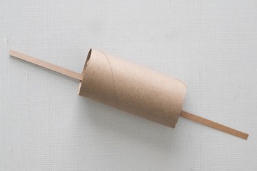 Cracker snap in a toilet paper tube