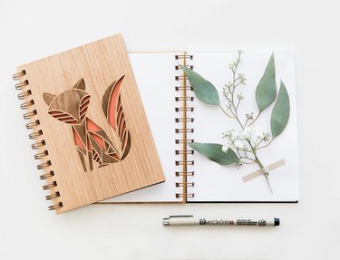 Journal with wood cover engraved with a fox
