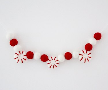 Red and white felt garland with felt peppermints