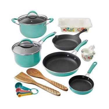 Teal cookware set by The Pioneer Woman, some with floral motifs.