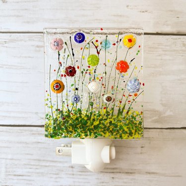 Glass nightlight featuring colorful glass beads in a wildflower design