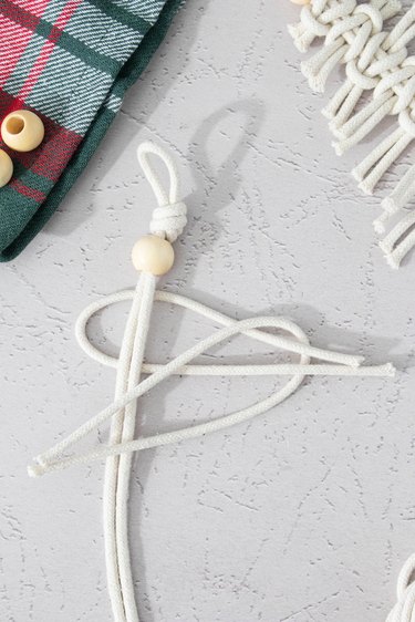 Tying a lark knot with macrame cord