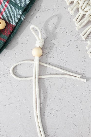 Tying a lark knot with macrame cord