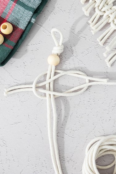 Tying a lark knot with macrame cord