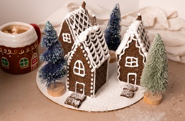 Cute graham cracker village with white royal icing