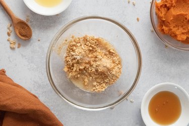 Graham cracker crust ingredients in a bowl