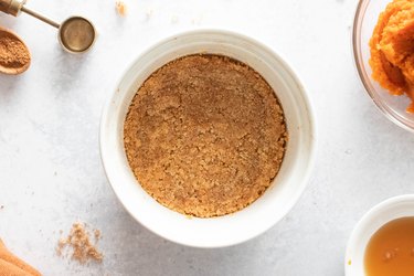 Graham cracker crust in a ramekin