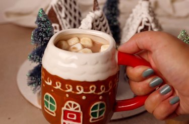 Milo mocha in a gingerbread house mug
