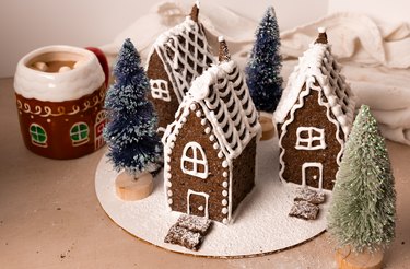 Cute graham cracker village with white royal icing