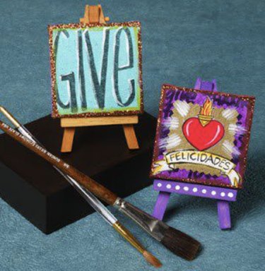 Words "give" and "congratulations" on mini easels
