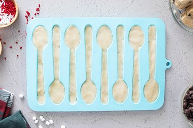 Spoon mold filled with cookie dough