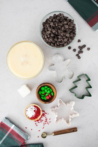 Ingredients and supplies for peppermint fudge-filled cookie cutters