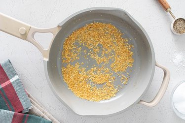 Drying lemon zest in a skillet