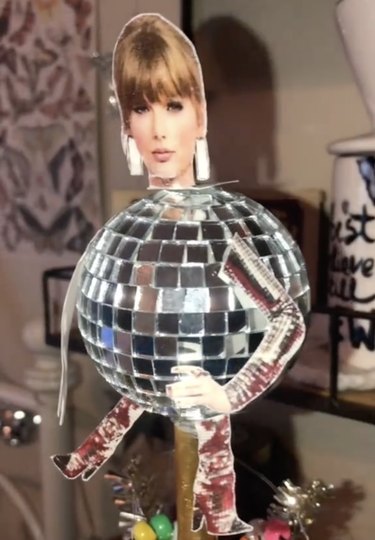 Mini disco ball tree topper featuring a photo of Taylor Swift