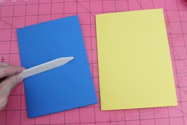 Bone folder with folded card stock
