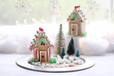 Decorated gingerbread houses made from graham crackers