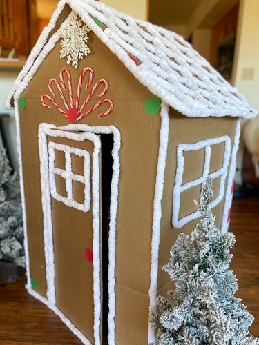 Door on the back of gingerbread house puppet theater