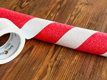 Wrap white duct tape around a pool noodle