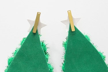 Glue flat charm to back of pom pom Christmas trees