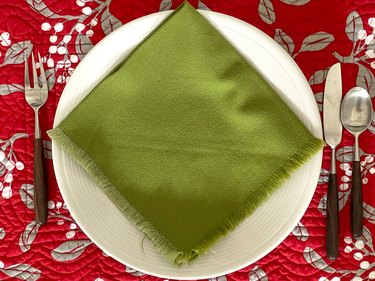 fold a green napkin in half