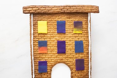Add fondant windows to the gingerbread building