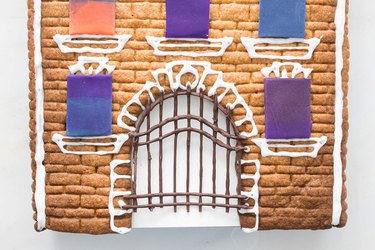 Add the chocolate gate to the archway