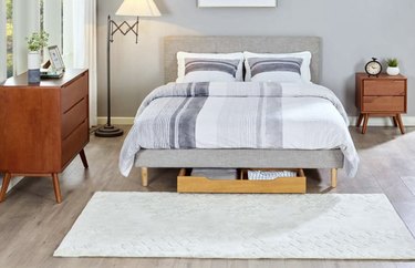 Wooden trundle drawer in bedroom