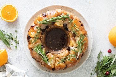 Cranberry-orange monkey bread wreath on a plate