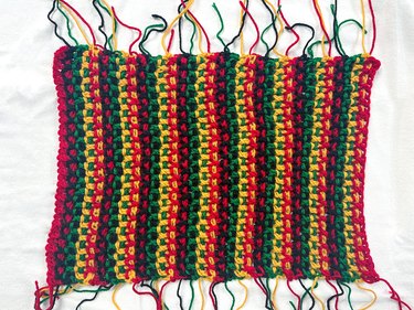 Finished mkeka mat with loose yarn ends