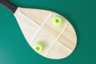 Pickleball paddle with edible court details made of fondant and cheese